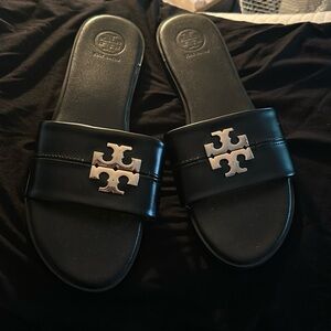 Tory woman’s sandals size 11 but would definitely fit if you wear size 10